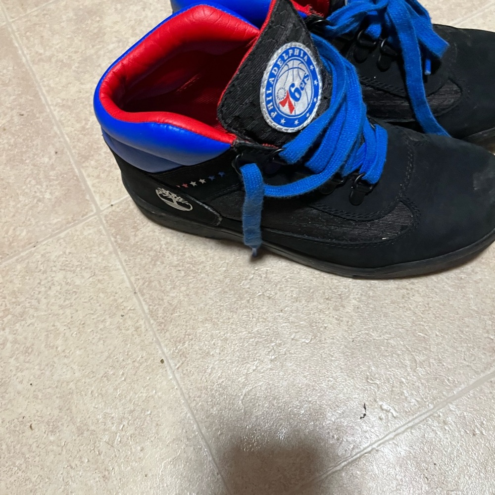 Gently used 76ers boys timberland boots size 4.5